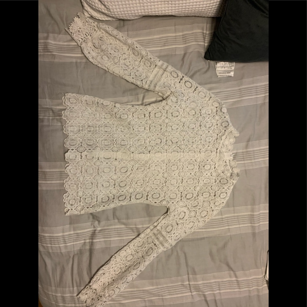 Beautiful white lace nigh neck shirt